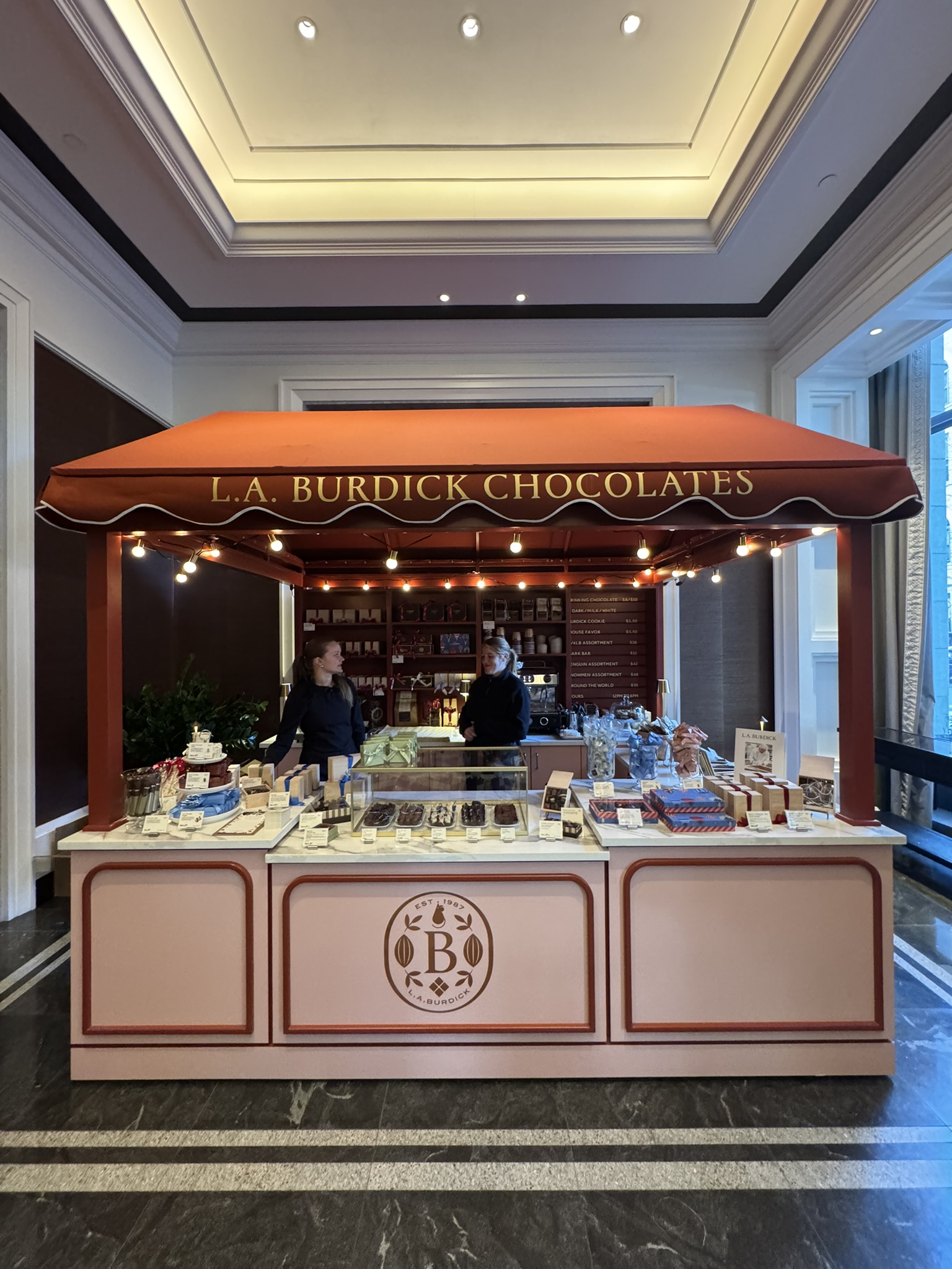 L.A. Burdick, the renowned chocolatier known for its handmade confections and European-style hot chocolate, has brought its signature warmth and elegance to the heart of Boston’s most refined hospitality destination: the Four Seasons Hotel at One Dalton. Designed by ArnoldAnd